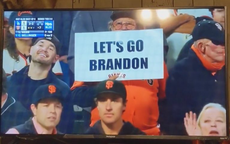 “LET’S GO BRANDON” – Giants Fan Holds Sign for the Cameras At Playoff Game