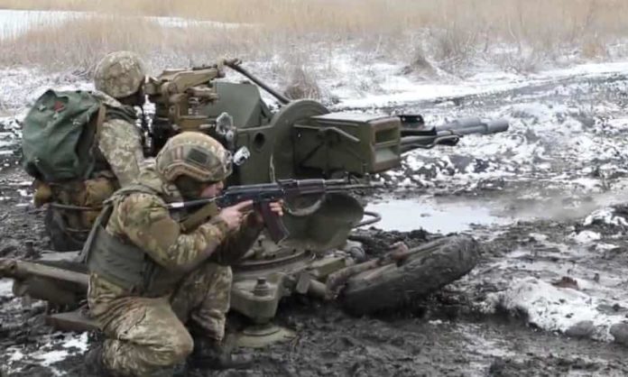 Russia claims mass civilian graves found in Donbas