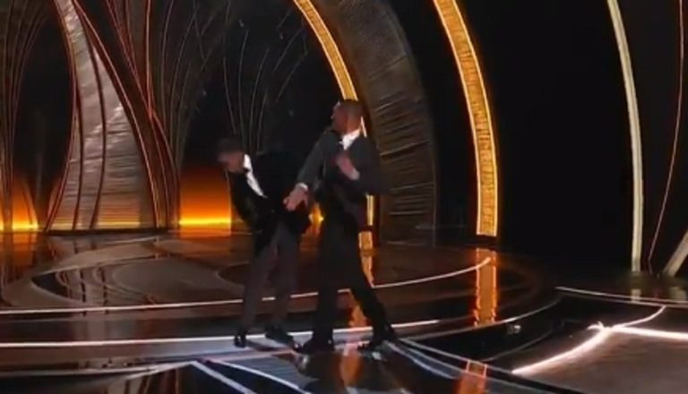 WATCH: Will Smith Rushes Oscar Stage And Socks Chris Rock In The Face For Insulting His Wife