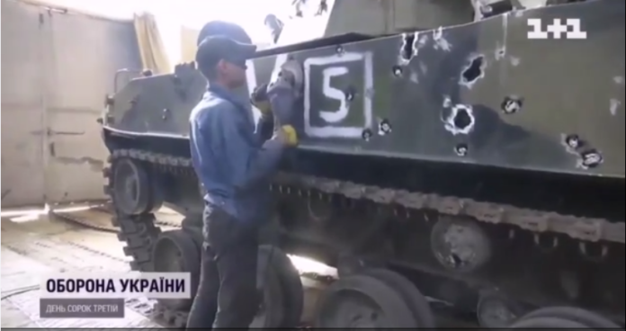 Ukrainian workshop where they are working on some of the Captured Russian Vehicles